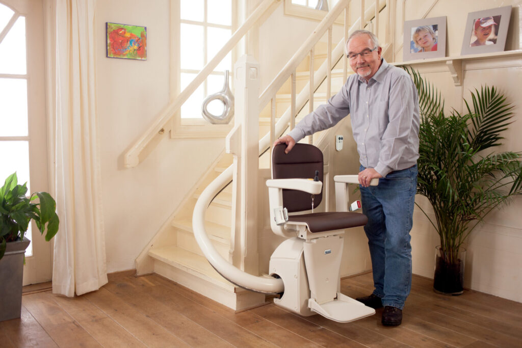 An Elderly man looking at selling his stairlift